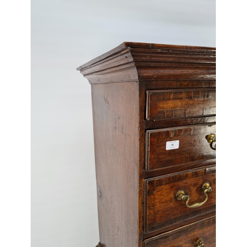 72 - A GEORGE III OAK CHEST ON CHEST WITH TWO SHORT OVER THREE LONG DRAWERS TO THE UPPER HALF AND A FURTH... 