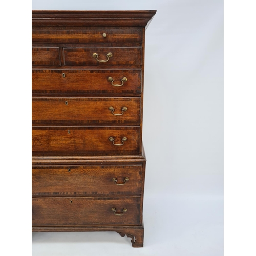 72 - A GEORGE III OAK CHEST ON CHEST WITH TWO SHORT OVER THREE LONG DRAWERS TO THE UPPER HALF AND A FURTH... 