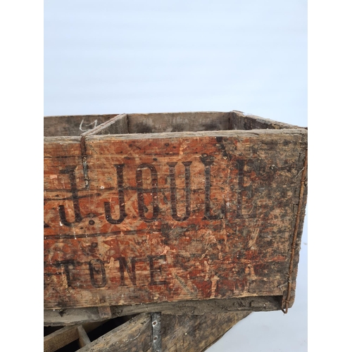 22 - TWO VINTAGE WOODEN BEER BOTTLE CARRYING CRATES TO INCLUDE A W.H. & J. JOULE EXAMPLE