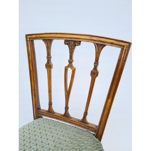 43 - AN EDWARDIAN OAK FRAMED SIDE CHAIR WITH WHEATSHEAF SLATTED BACK, TURQUOISE UPHOLSTERED SEAT AND TAPE... 