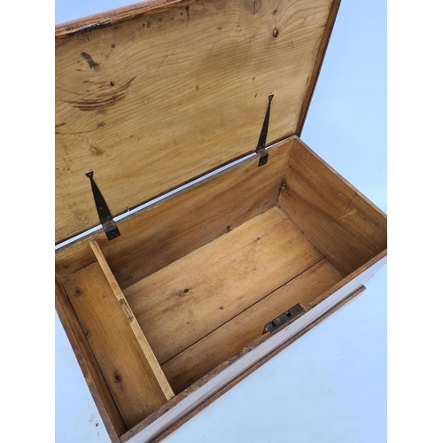 75 - A VICTORIAN PINE BLANKET BOX ON BRACKET FEET WITH BRASS ESCUTCHEON, REPLACED BRASS HANDLES AND INNER... 