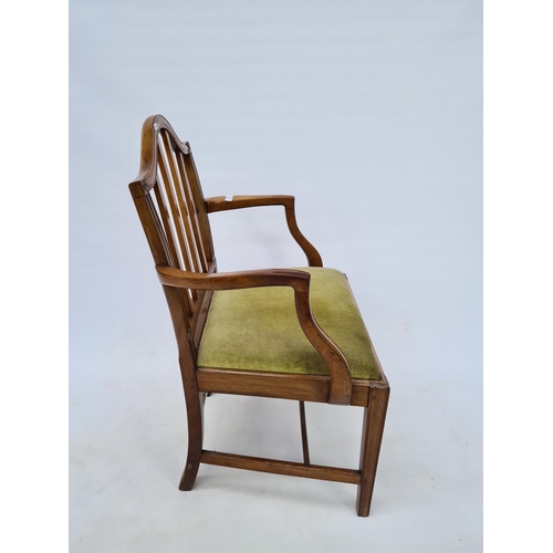 15 - A GEORGIAN MAHOGANY FRAMED ELBOW CARVER CHAIR WITH SLATTED AND ARCHED BACK, TAPERED SUPPORTS, LOWER ... 