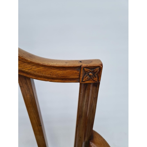 15 - A GEORGIAN MAHOGANY FRAMED ELBOW CARVER CHAIR WITH SLATTED AND ARCHED BACK, TAPERED SUPPORTS, LOWER ... 