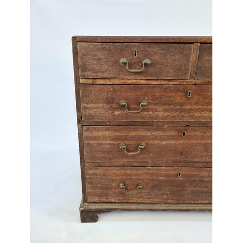 39 - A GEORGIAN OAK CHEST OF TWO SHORT OVER THREE LONG DRAWERS WITH ORIGINAL BRASS SWAN NECK HANDLES AND ... 