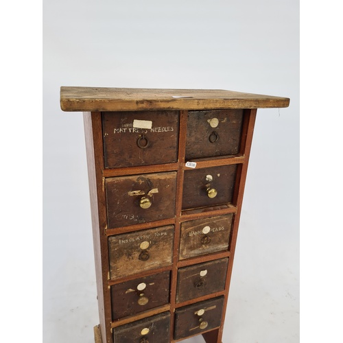 4 - A VINTAGE SCRATCH BUILT TEN DRAWER APOTHECARY CHEST - MEASURING APPROX. HEIGHT 85CM, WIDTH 44CM AND ... 