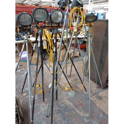 379 - SIX 110 VOLT WORK LIGHTS ON TRIPOD STANDS