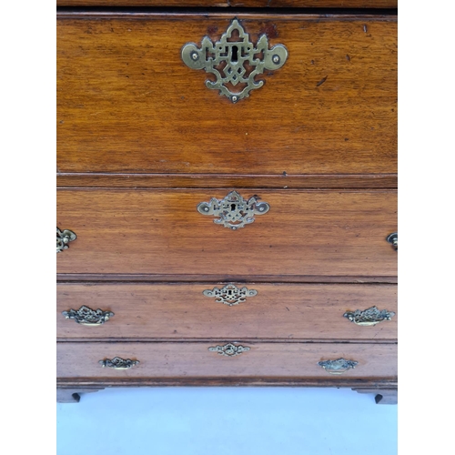 10 - AN IMPRESSIVE GEORGIAN OAK CHEST OF TWO SHORT OVER FOUR LONG DRAWERS WITH UNUSUAL BRASS ORIENTAL INF... 