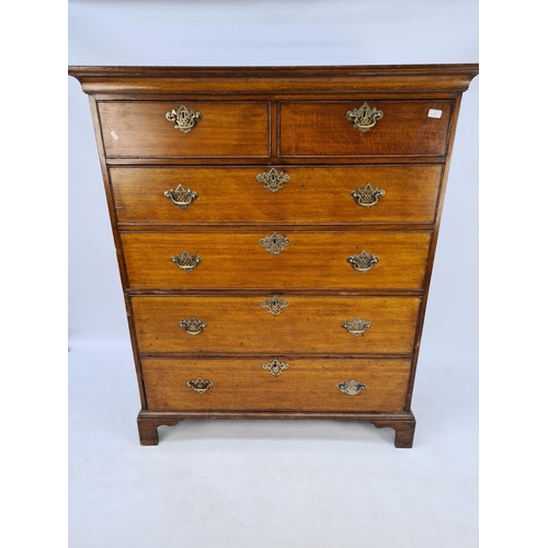 10 - AN IMPRESSIVE GEORGIAN OAK CHEST OF TWO SHORT OVER FOUR LONG DRAWERS WITH UNUSUAL BRASS ORIENTAL INF... 