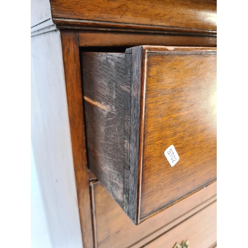 10 - AN IMPRESSIVE GEORGIAN OAK CHEST OF TWO SHORT OVER FOUR LONG DRAWERS WITH UNUSUAL BRASS ORIENTAL INF... 