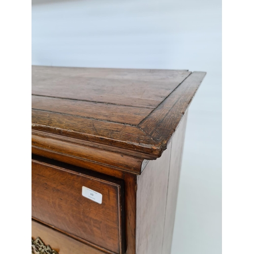 10 - AN IMPRESSIVE GEORGIAN OAK CHEST OF TWO SHORT OVER FOUR LONG DRAWERS WITH UNUSUAL BRASS ORIENTAL INF... 