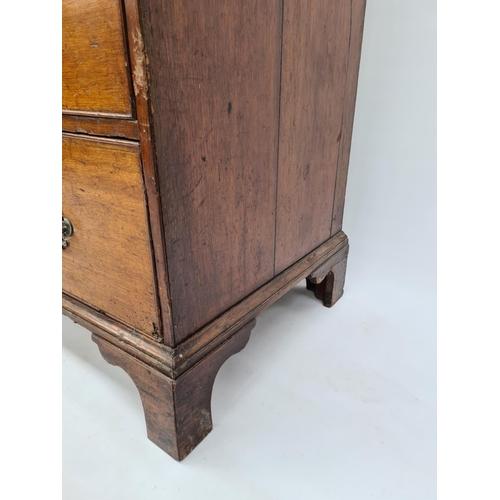 10 - AN IMPRESSIVE GEORGIAN OAK CHEST OF TWO SHORT OVER FOUR LONG DRAWERS WITH UNUSUAL BRASS ORIENTAL INF... 