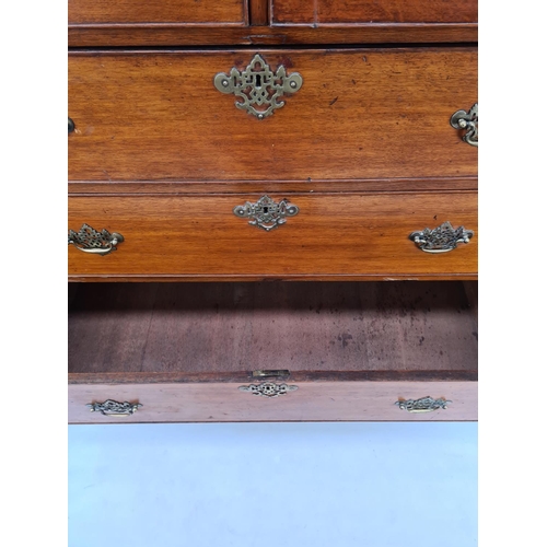 10 - AN IMPRESSIVE GEORGIAN OAK CHEST OF TWO SHORT OVER FOUR LONG DRAWERS WITH UNUSUAL BRASS ORIENTAL INF... 