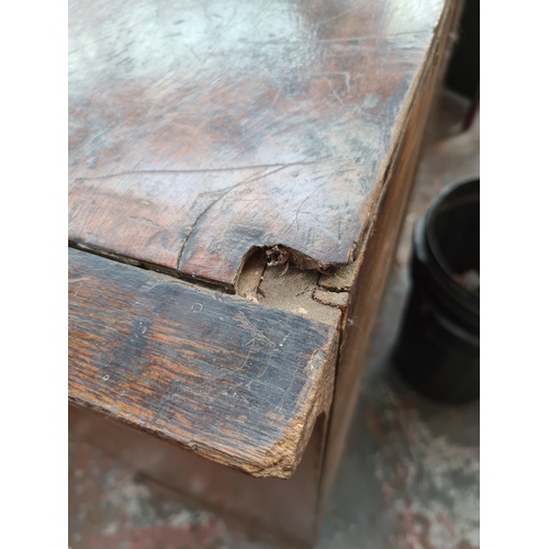 10 - AN IMPRESSIVE GEORGIAN OAK CHEST OF TWO SHORT OVER FOUR LONG DRAWERS WITH UNUSUAL BRASS ORIENTAL INF... 