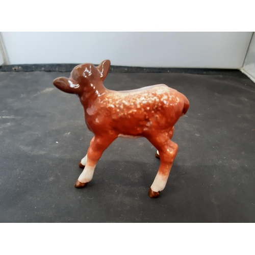 184 - A BESWICK DAIRY SHORTHORN CALF FIGURINE - MODEL NO. 1406C