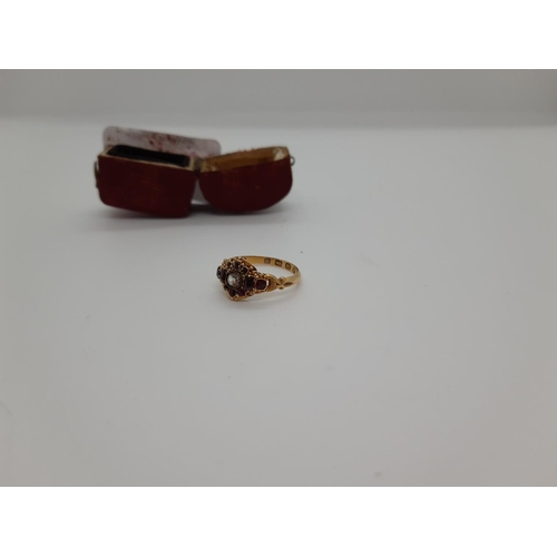 65 - A VICTORIAN HALLMARKED BIRMINGHAM 18CT GOLD LADIES RING WITH INSET DIAMANTE STONE AND SURROUNDING AM... 