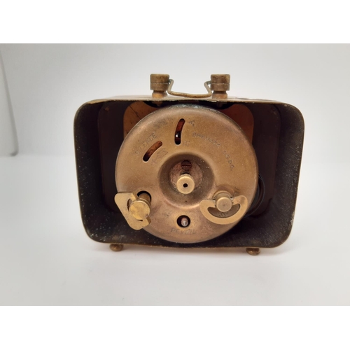 165 - A 1930'S BREVETE SGDC BRASS CASED TRAVEL CLOCK