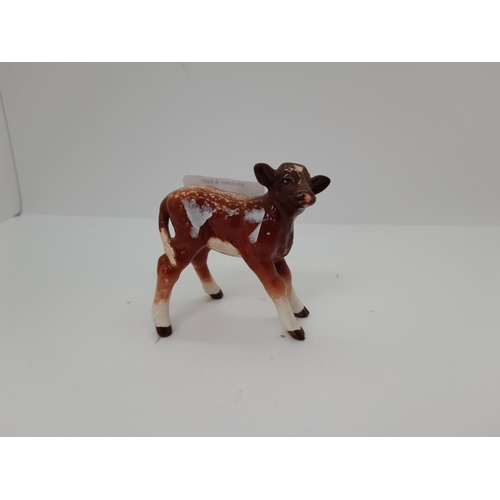 184 - A BESWICK DAIRY SHORTHORN CALF FIGURINE - MODEL NO. 1406C