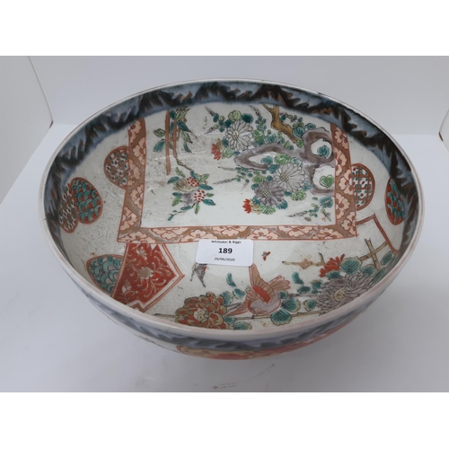 189 - A LATE 19TH/EARLY 20TH CENTURY JAPANESE FOOTED BOWL WITH BIRD AND FOLIAGE DESIGN AND REPEATED BORDER... 