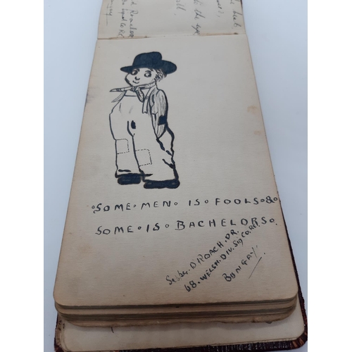 76 - A UNIQUE WW1 PERIOD AUTOGRAPH ALBUM CONTAINING PERSONAL MESSAGES, GREETINGS, JOKES, SKETCHES AND MUS... 