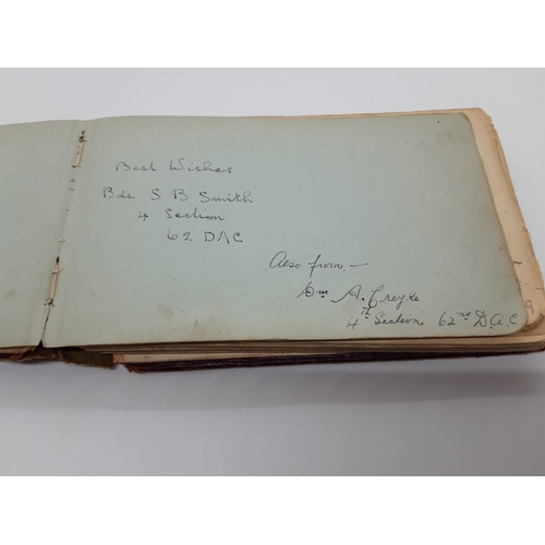 76 - A UNIQUE WW1 PERIOD AUTOGRAPH ALBUM CONTAINING PERSONAL MESSAGES, GREETINGS, JOKES, SKETCHES AND MUS... 