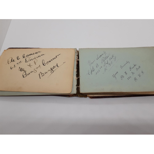 76 - A UNIQUE WW1 PERIOD AUTOGRAPH ALBUM CONTAINING PERSONAL MESSAGES, GREETINGS, JOKES, SKETCHES AND MUS... 