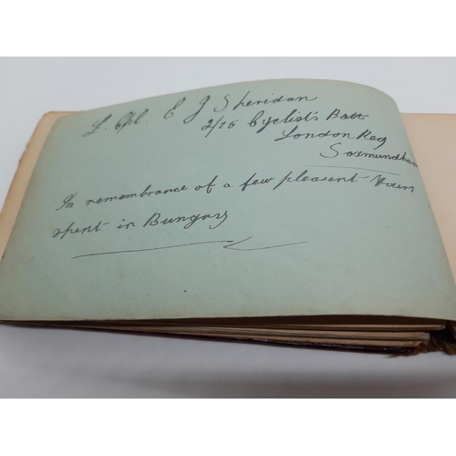 76 - A UNIQUE WW1 PERIOD AUTOGRAPH ALBUM CONTAINING PERSONAL MESSAGES, GREETINGS, JOKES, SKETCHES AND MUS... 