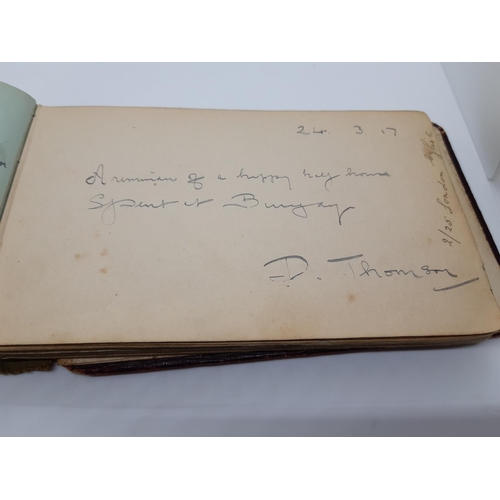 76 - A UNIQUE WW1 PERIOD AUTOGRAPH ALBUM CONTAINING PERSONAL MESSAGES, GREETINGS, JOKES, SKETCHES AND MUS... 