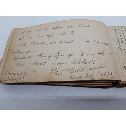 76 - A UNIQUE WW1 PERIOD AUTOGRAPH ALBUM CONTAINING PERSONAL MESSAGES, GREETINGS, JOKES, SKETCHES AND MUS... 