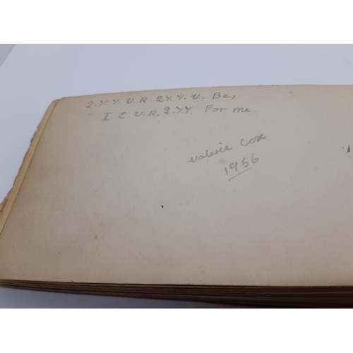 76 - A UNIQUE WW1 PERIOD AUTOGRAPH ALBUM CONTAINING PERSONAL MESSAGES, GREETINGS, JOKES, SKETCHES AND MUS... 