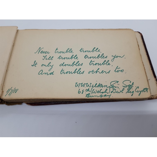 76 - A UNIQUE WW1 PERIOD AUTOGRAPH ALBUM CONTAINING PERSONAL MESSAGES, GREETINGS, JOKES, SKETCHES AND MUS... 