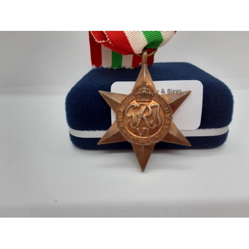 77 - A GROUP OF THREE WWII MEDALS TO INCLUDE THE AFRICA STAR, THE BURMA STAR AND THE ITALY STAR TOGETHER ... 