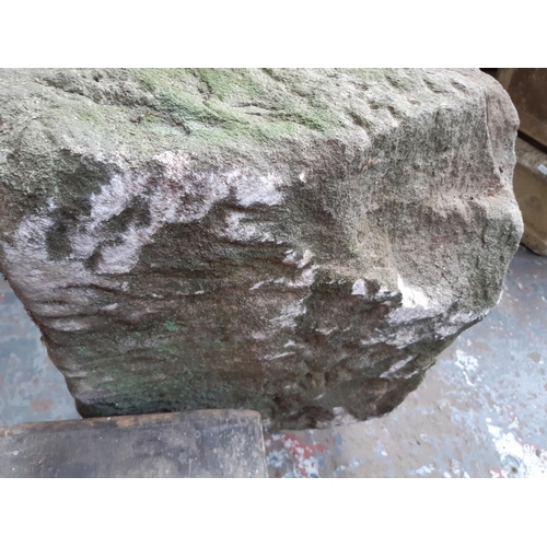 437 - AN 18TH CENTURY HEAVY SANDSTONE TROUGH -MEASURING APPROX. 3'4