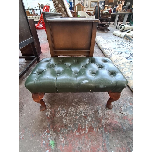 777 - A GREEN LEATHER CHESTERFIELD STYLE RECTANGULAR FOOTSTOOL ON CABRIOLE SUPPORTS