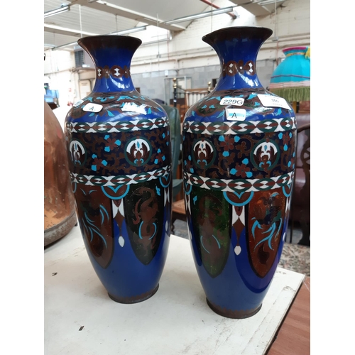 105 - A MATCHING PAIR OF EARLY 20TH CENTURY CLOISONNE VASES WITH SHADES OF BLUES, GREENS, WHITES AND BROWN... 