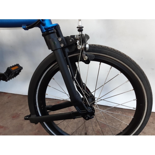 288 - A BAGGED BLACK AND BLUE MEZZO D9 FOLDING BICYCLE WITH LIGHTWEIGHT ALLOY FRAME, QUICK RELEASE WHEELS ... 