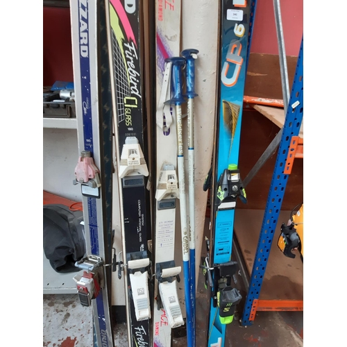 340 - A LARGE SELECTION OF SNOW SKIING EQUIPMENT TO INCLUDE BLIZZARD, HEAD SKIS, GABEL POLES ETC.