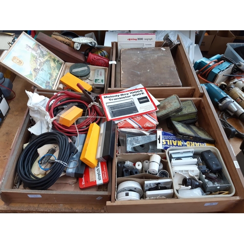 390 - FOUR MIXED BOXES CONTAINING DRILL BITS, TAP AND DIES, WOODEN CASED OIL STONE, LIGHT SWITCHES, PLUG S... 