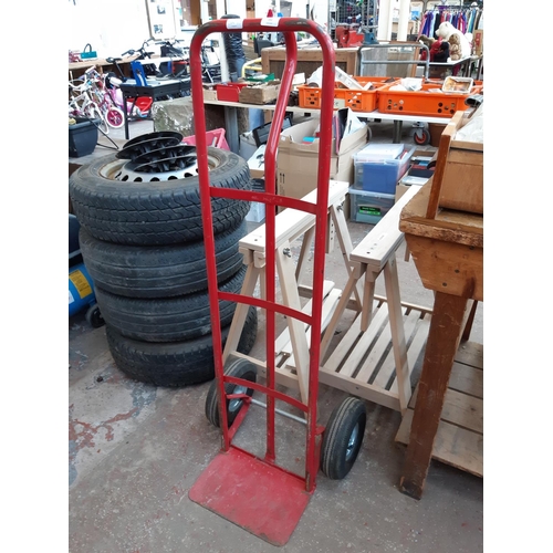 393 - A RED METAL TWO WHEELED SACK TRUCK