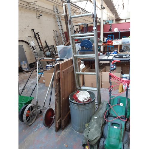 449 - A MIXED LOT TO INCLUDE GALVANISED DUSTBIN, BAGGED CAMPING CHAIRS, ABRU THREE WAY ALUMINIUM WORK LADD... 