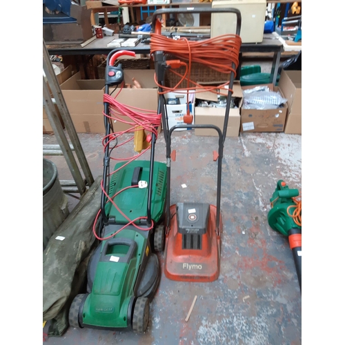 450 - TWO ITEMS TO INCLUDE AN ORANGE FLYMO ELECTRIC HOVER MOWER AND A BLACK AND GREEN QUALCAST ELECTRIC LA... 