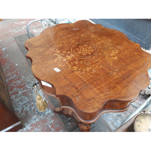 79 - A VICTORIAN INLAID ROSEWOOD SEWING TABLE WITH INTERNAL STORAGE, PEDESTAL BASE AND KEY - MEASURING AP... 