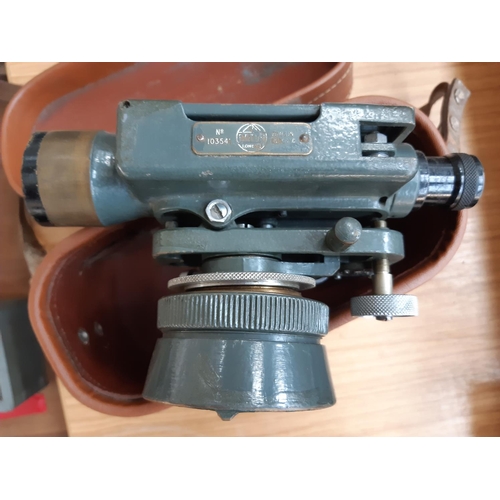 83 - TWO MID 20TH CENTURY HILGER & WATTS THEODOLITES TO INCLUDE ONE IN GREY METAL CASE AND ONE IN BROWN L... 