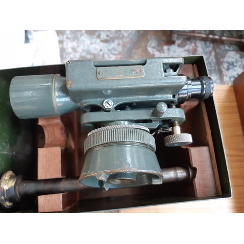 83 - TWO MID 20TH CENTURY HILGER & WATTS THEODOLITES TO INCLUDE ONE IN GREY METAL CASE AND ONE IN BROWN L... 