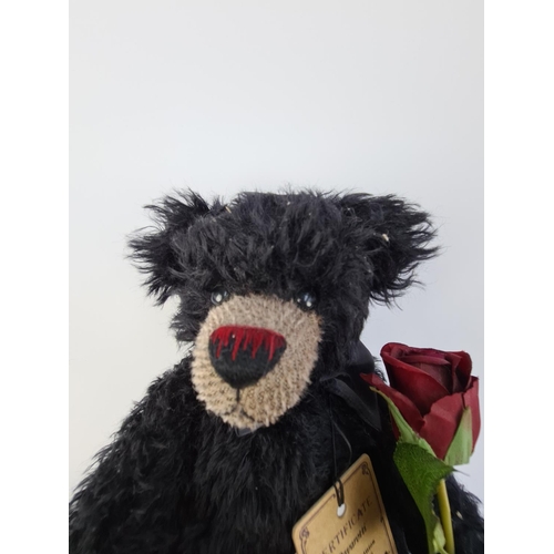 242 - A ROBIN RIVE LIMITED EDITION 94 OF 100 'PAVAROTTI' TEDDY BEAR WITH FLOWER AND CERTIFICATE