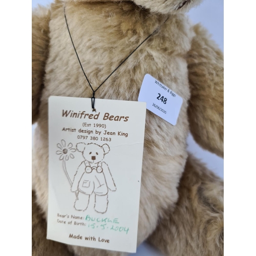 248 - A WINIFRED BEARS 'BUCKLE' COLLECTORS BEAR MADE FROM GERMAN MOHAIR WITH GLASS EYES AND SUEDE PAWS