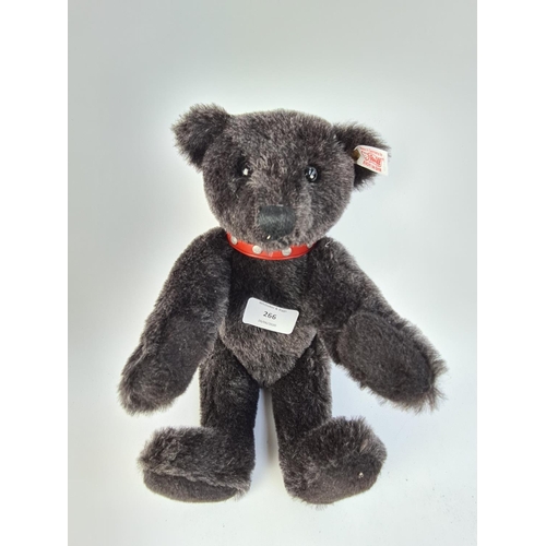 266 - A STEIFF 038150 LIMITED EDITION BLACK GROWLER TEDDY BEAR WITH RED LEATHER COLLAR