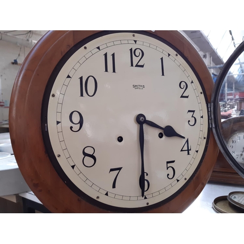 134 - A 1920'S ANGLO-SWISS RAILWAY/SCHOOL WALL CLOCK COMPRISING A MELLOW OAK TURNED CASE WITH BRASS BEZEL ... 