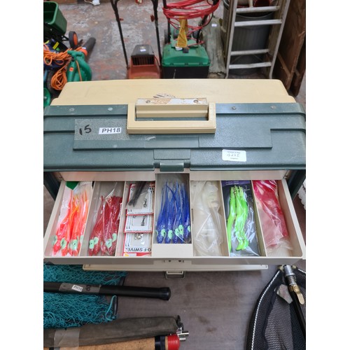 422E - A PLANOS 777S FISHING BOX CONTAINING VARIOUS EQUIPMENT TO INCLUDE LURES, BOOMS, HOOKS ETC.