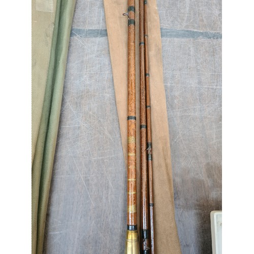 422K - A 9.5' SPLIT CANE FISHING ROD