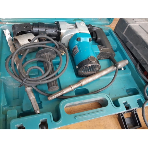 179 - A CASED BLUE MAKITA MAINS ELECTRIC HEAVY DUTY HAMMER DRILL